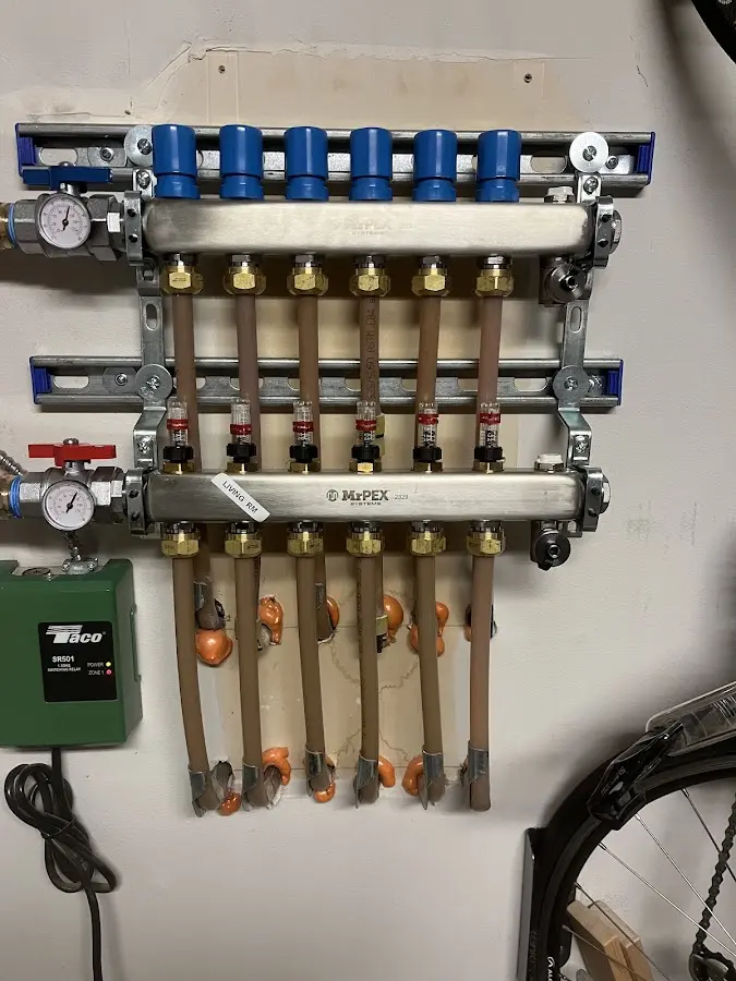 Plumber performing Gas Line Installation at a residential property in Brighton